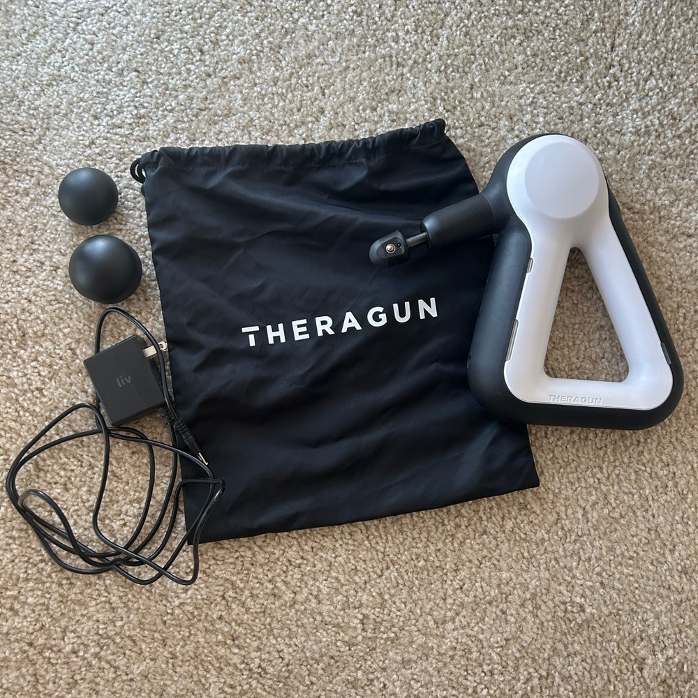 Theragun Massage Device in Black and White